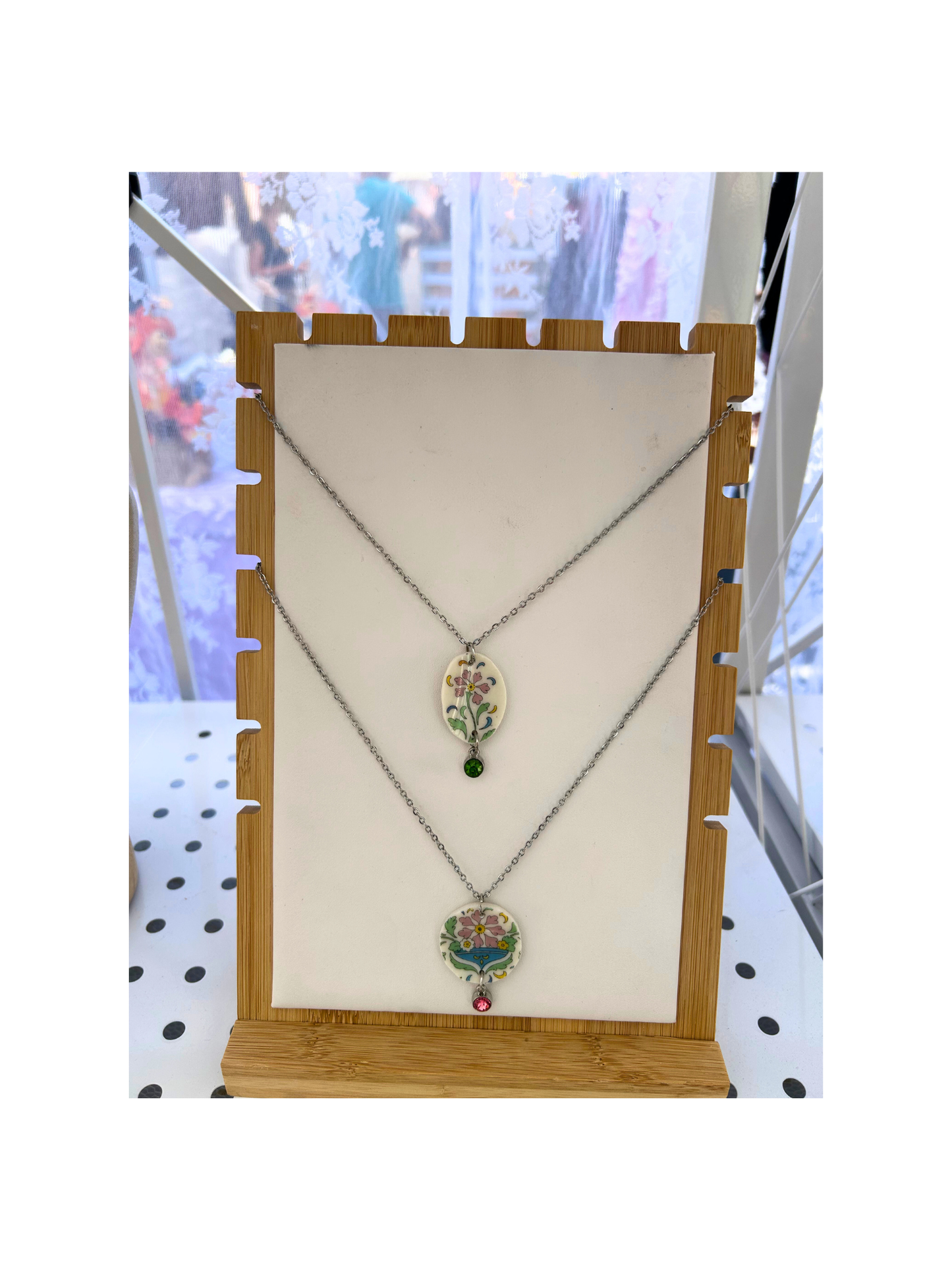 Oval and circular pink floral pendant necklace