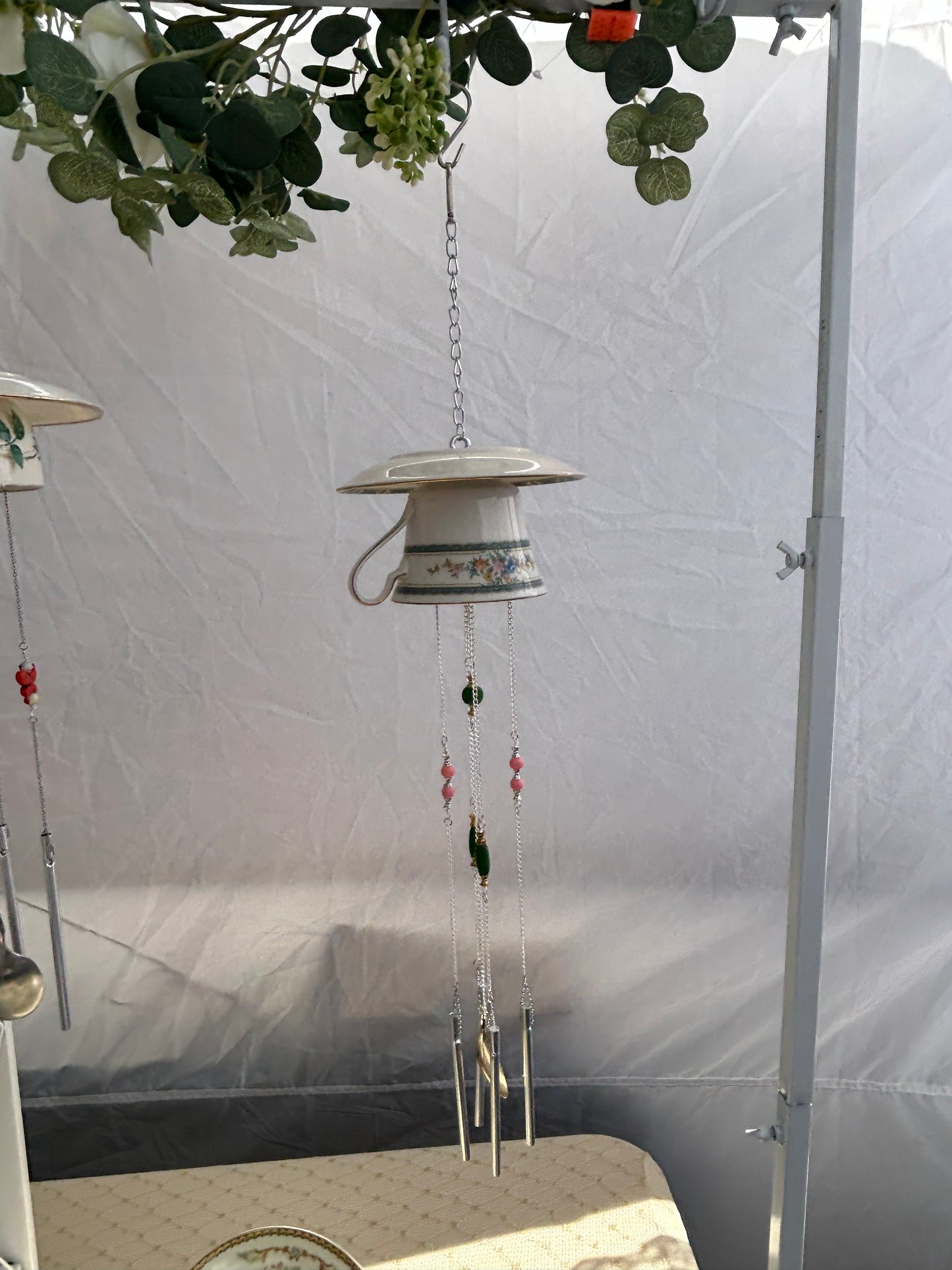 Green floral teacup wind chime